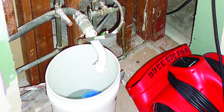 water-damage-from-water-heater-mastercraft-builder-group-disaster-restoration